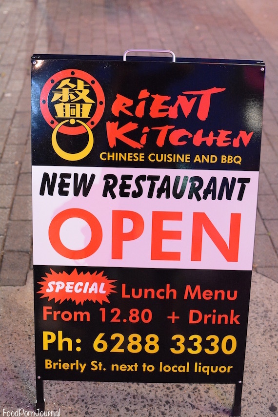 Orient Kitchen sign