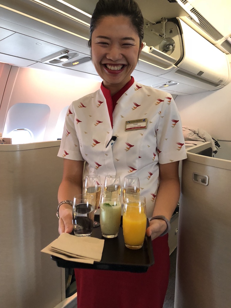 Cathay Pacific business class fight attendant