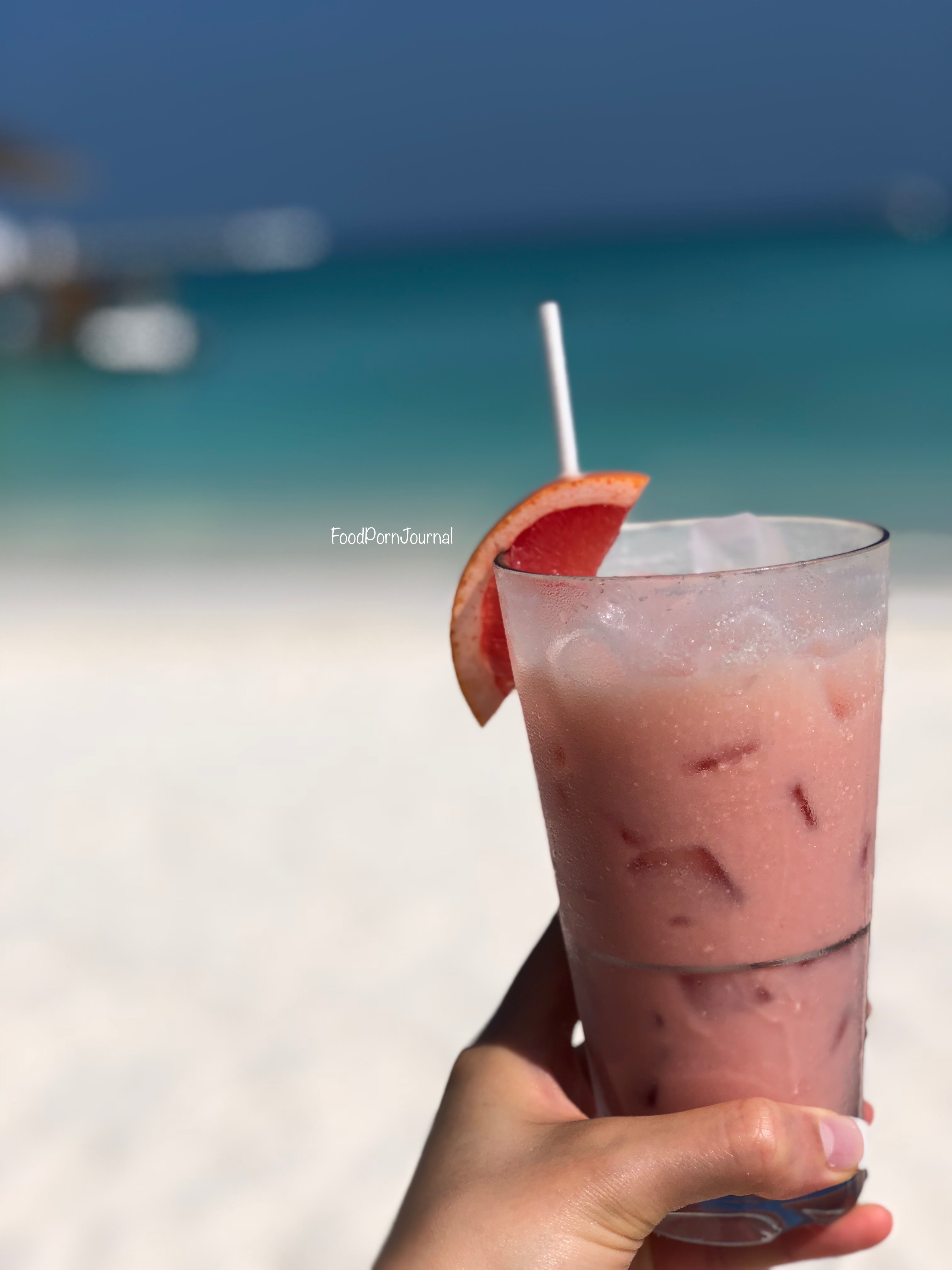 Maldives Finolhu mocktail on beach