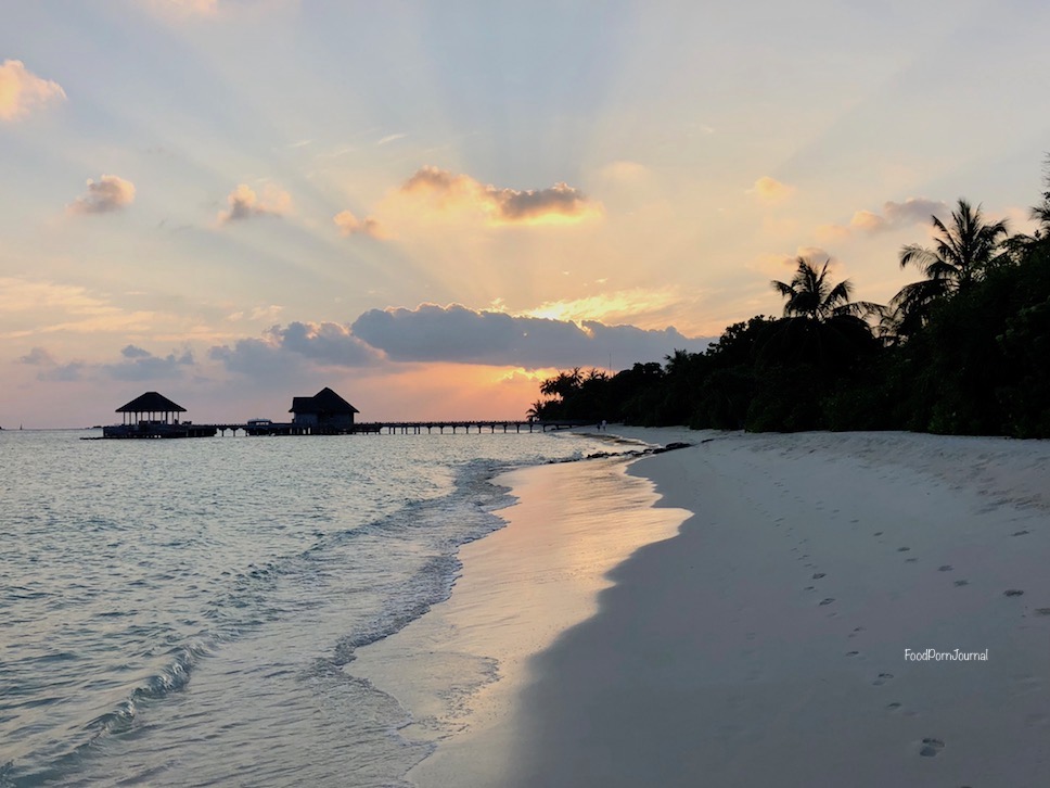 Finolhu Maldives sunrise walk on beach